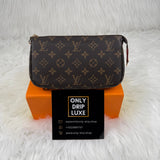 POCHETTE ACCESSOIRES TELA MONOGRAM