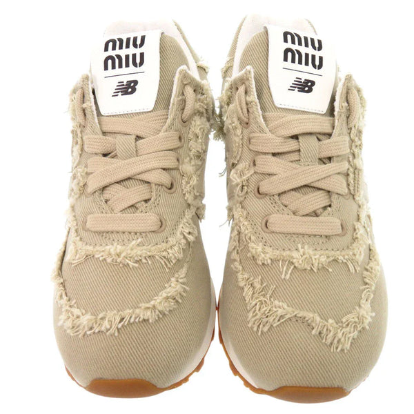 Miu Miu x New Balance 574 denim sneakers ll
